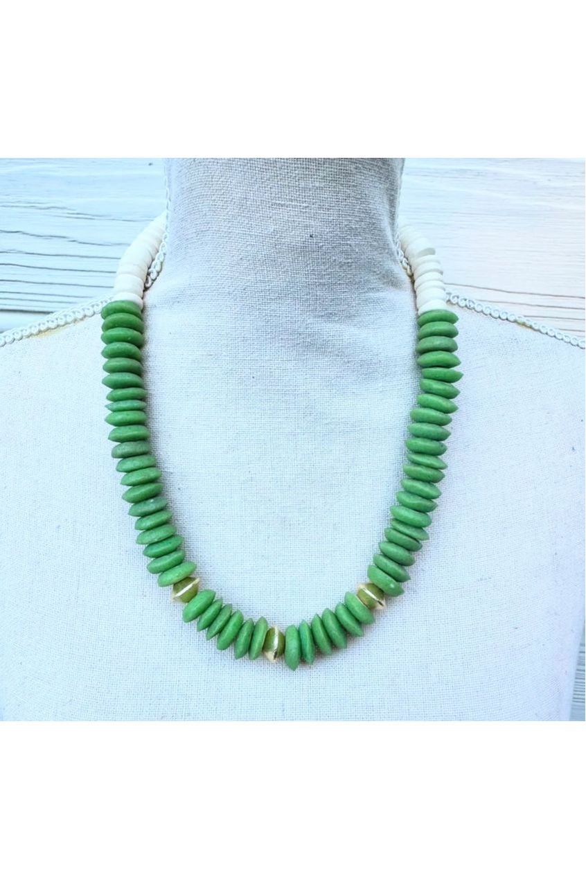 Necklace Made with green & gold wood and natural beads.  

Approximately 18”