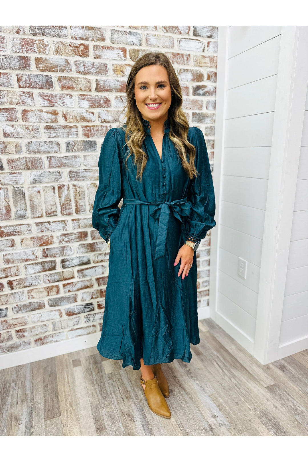 Deep blue dress with eye-lit trim