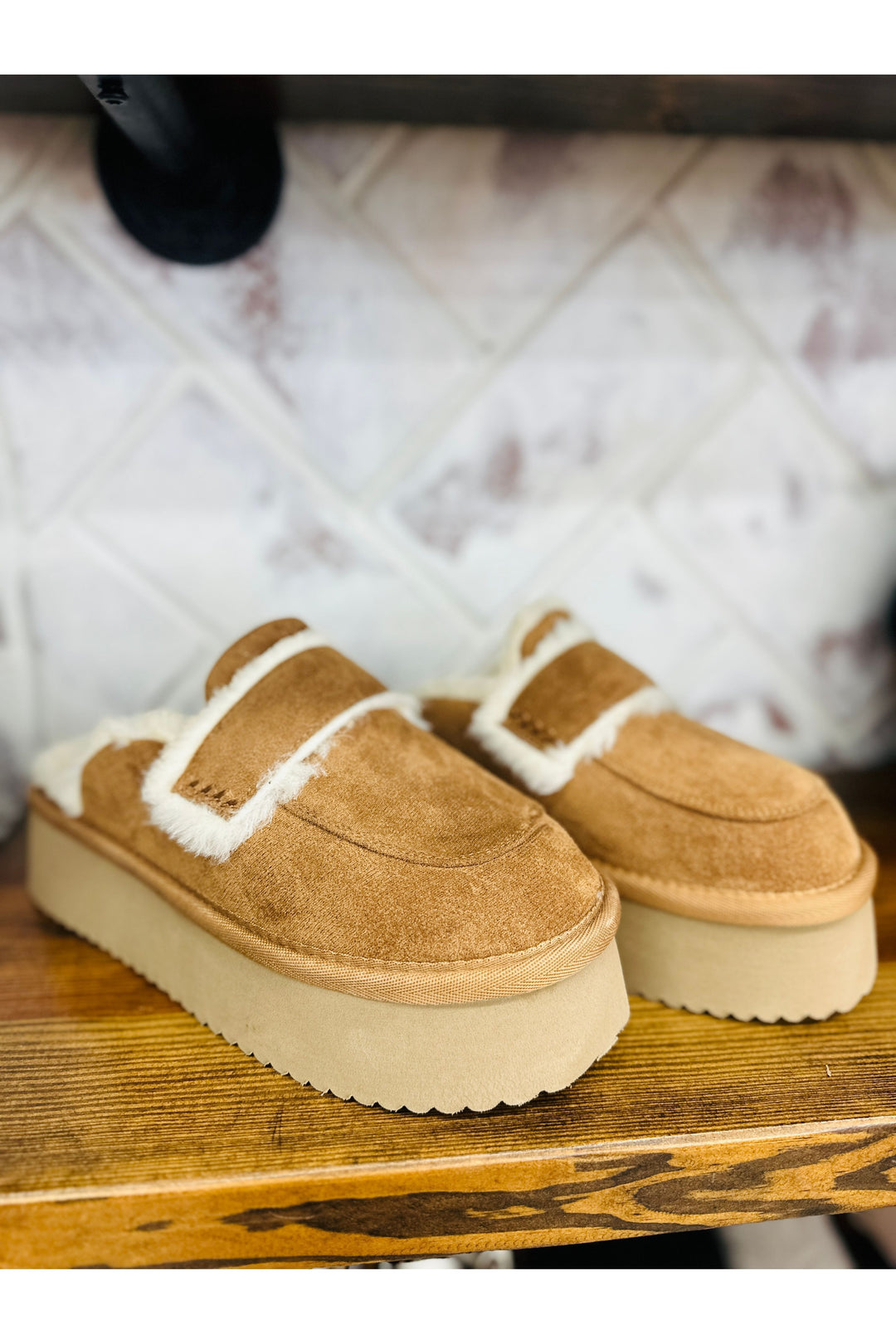 Tan platform slide lined with faux fur