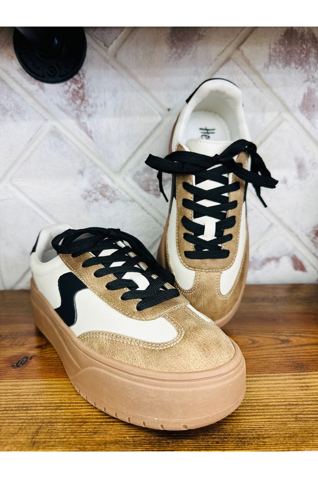 Black and tan sneaker
