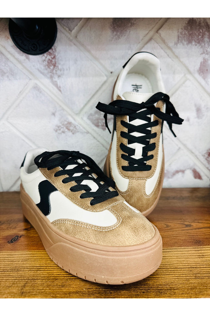 Black and tan sneaker