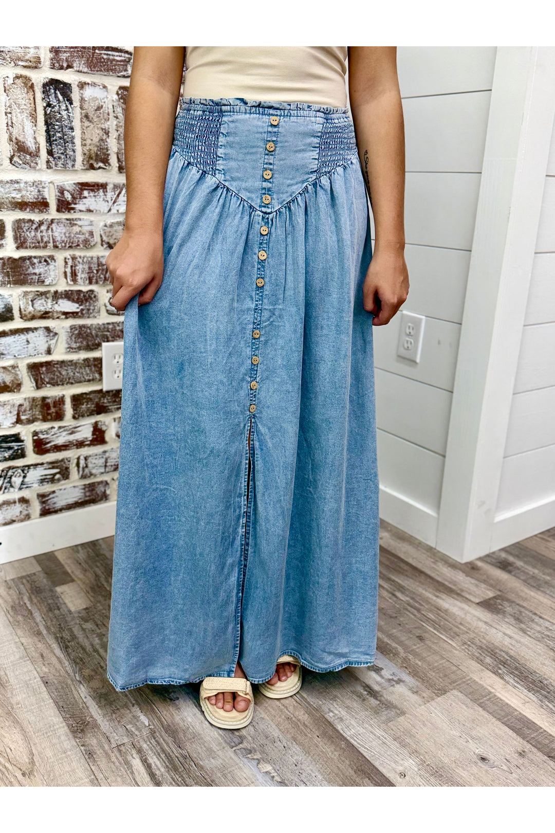 Denim Front Slit Maxi Skirt features a smocked waistband 
