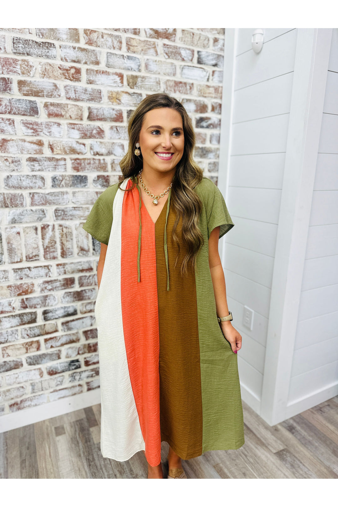 Woman wearing colorblock midi dress