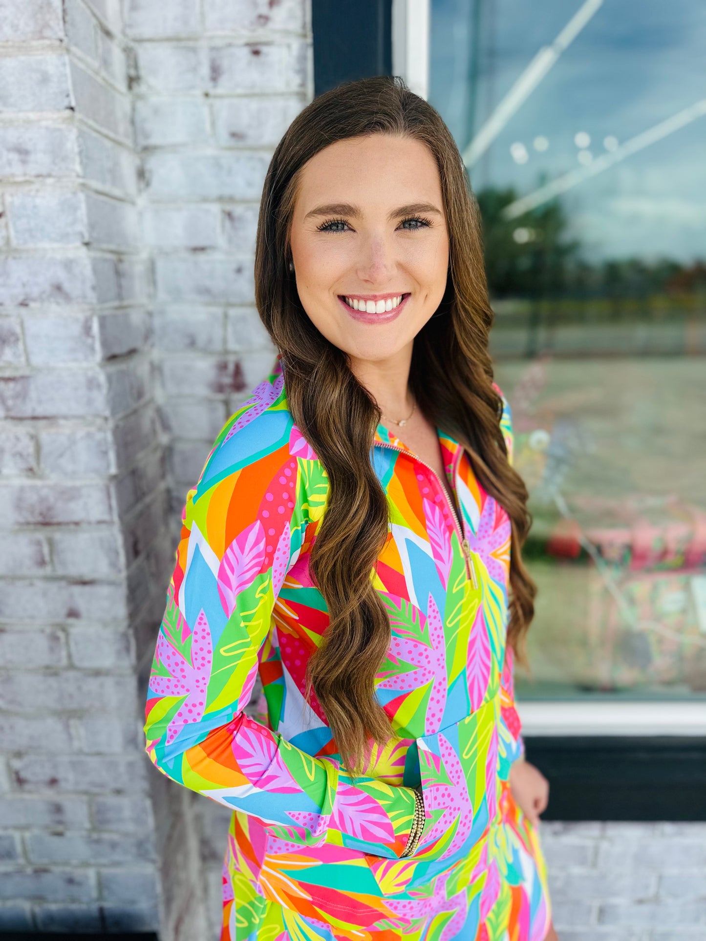 Get Tropical Hampton’s Half Zip TOP