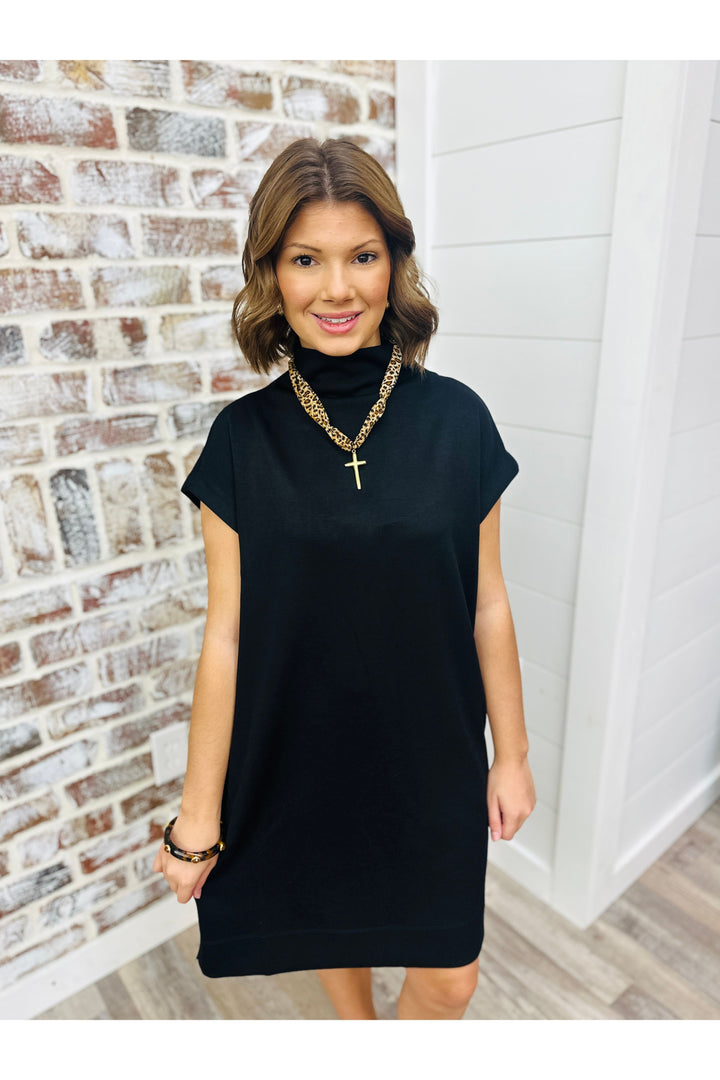 Solid black dress with turtleneck 