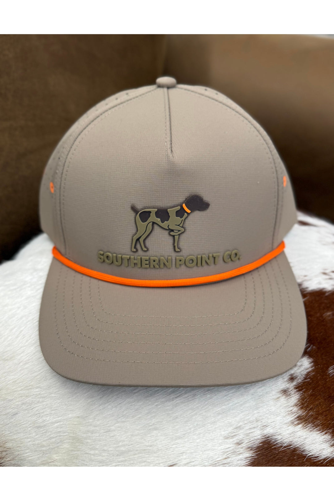 Khaki southern point co hat with orange rope and dog logo