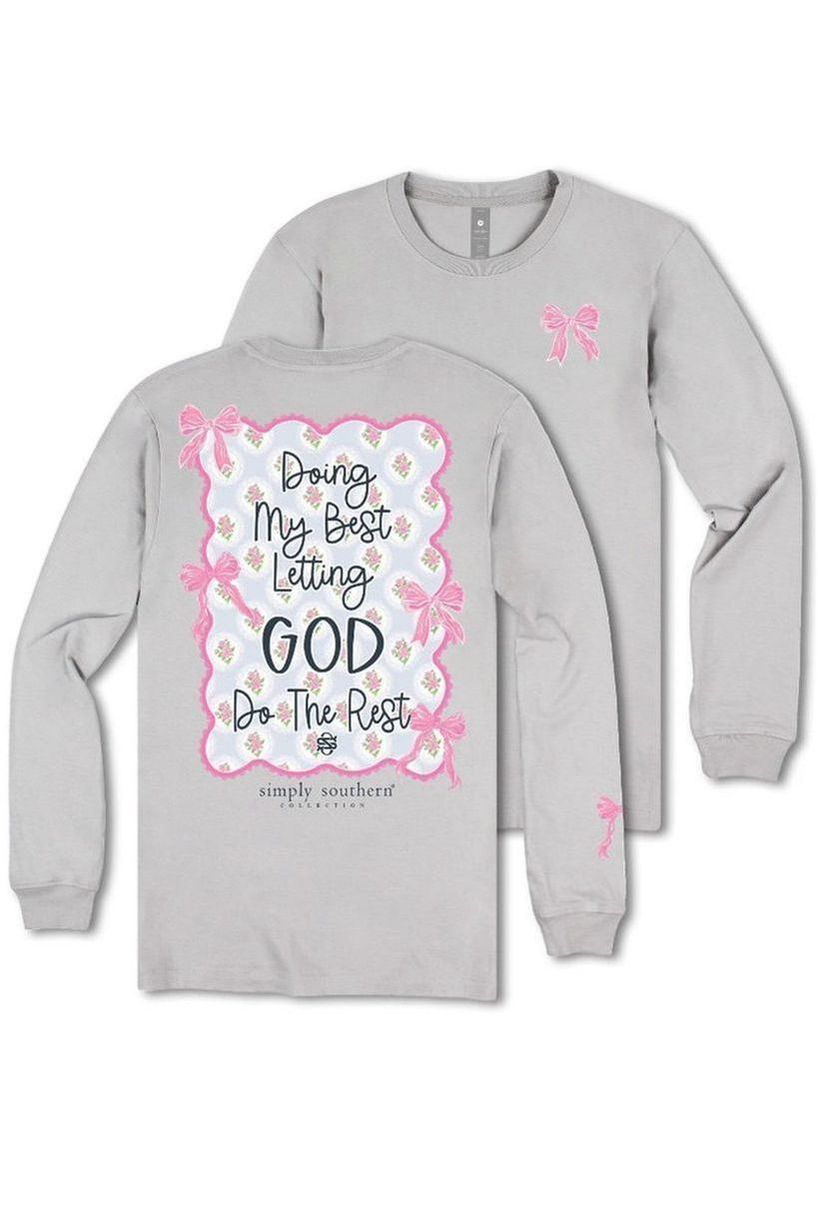 Kids long sleeve grey tee with “doing my best letting God do the rest” in a floral print with bows 