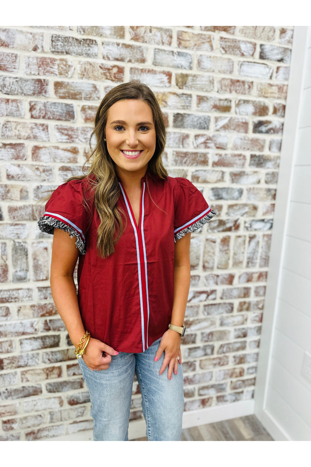 Burgundy top with fringe sleeves