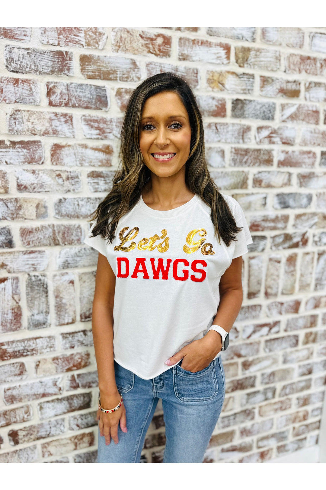 Let’s go dawgs in a white crop shirt 