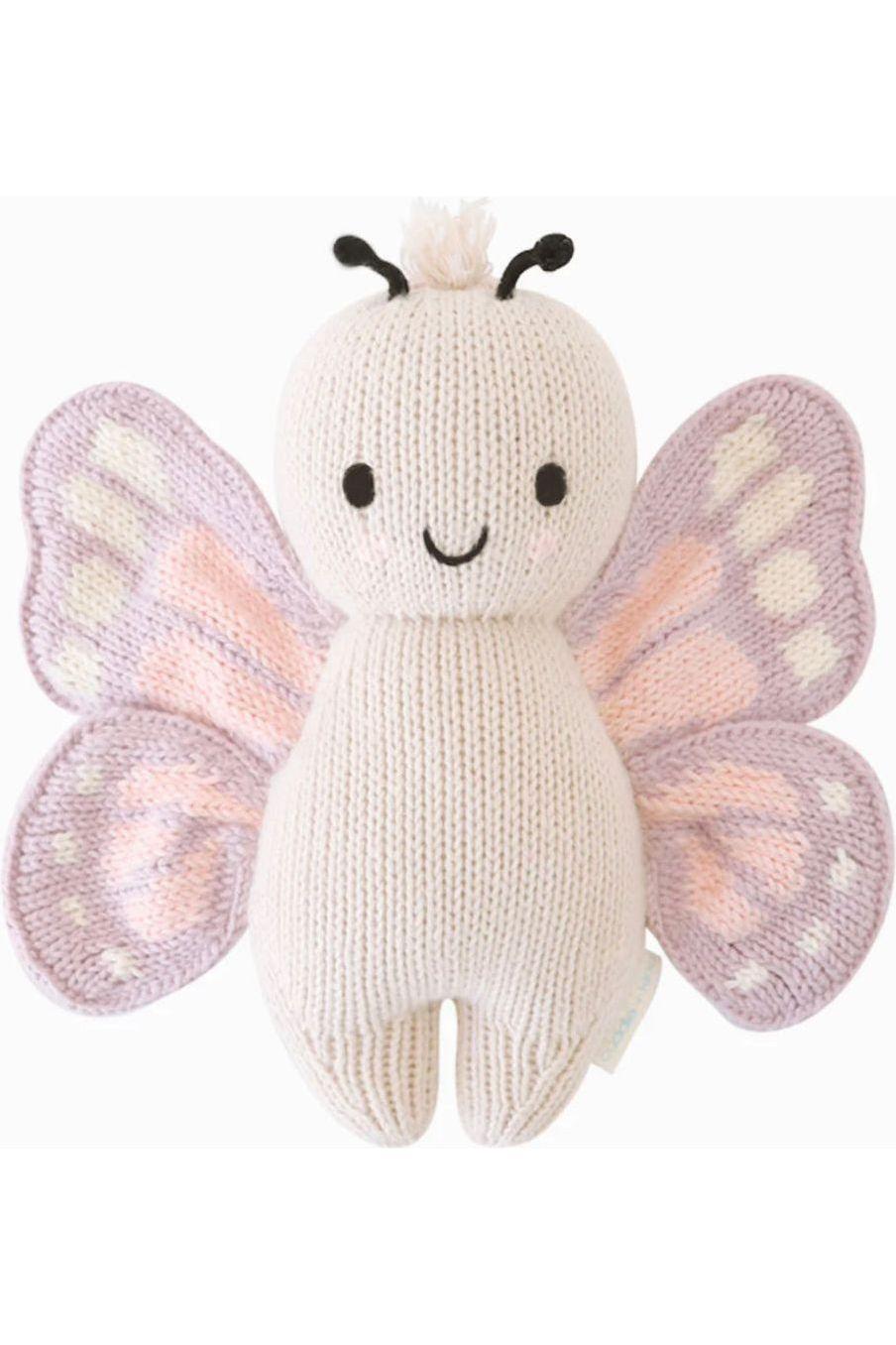 Stuffed toy butterfly with colorful wings.