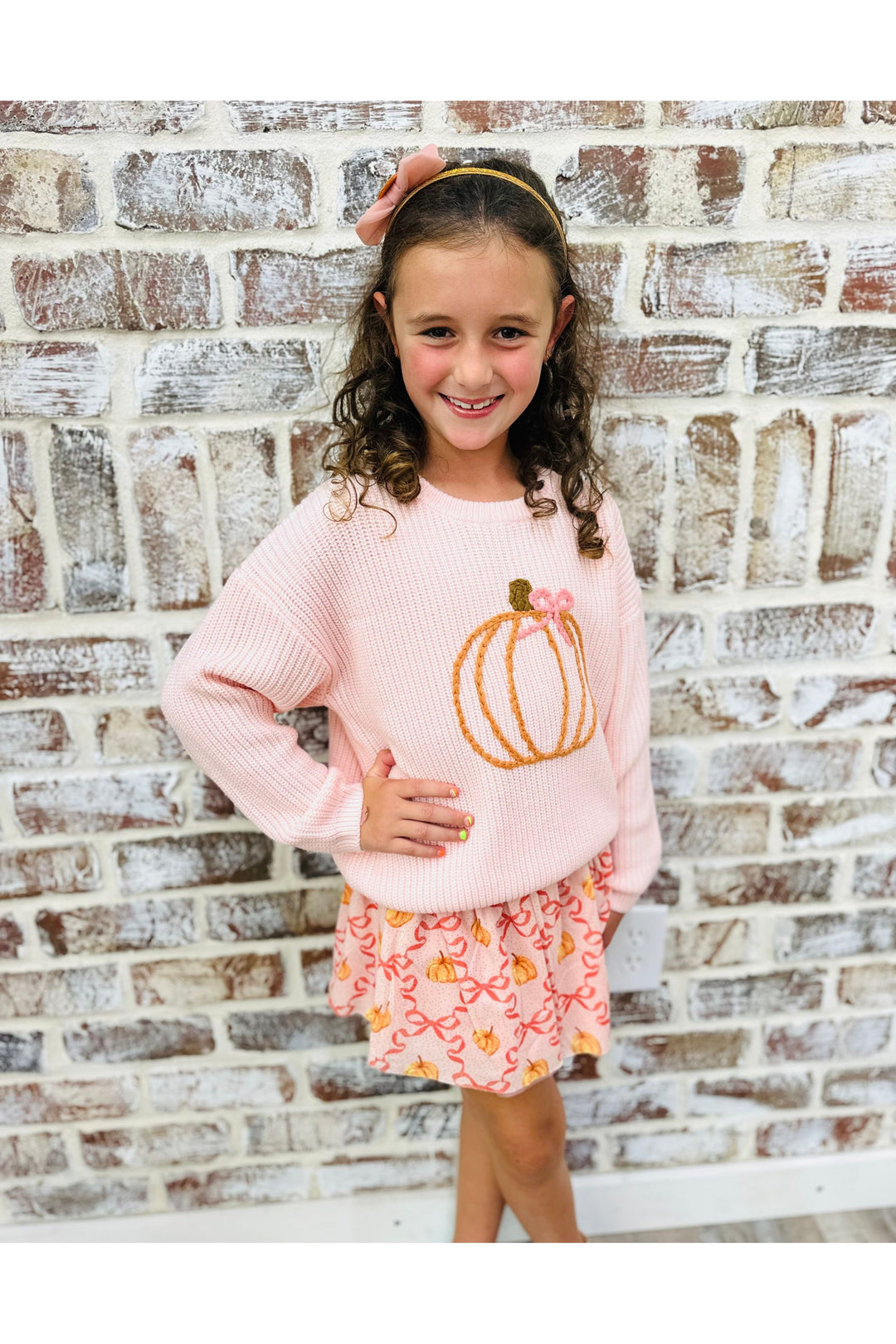 Youth sweater with pumpkin in pink 
