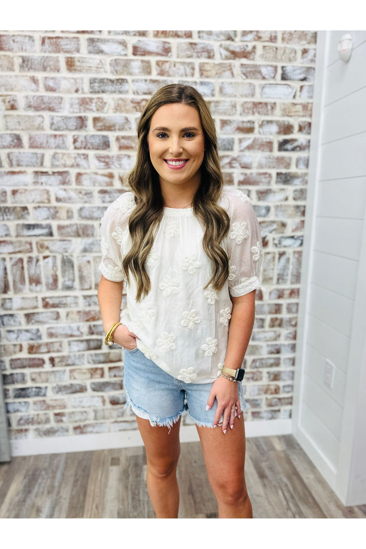 short sleeve sheer sleeve with embroidered flower details 