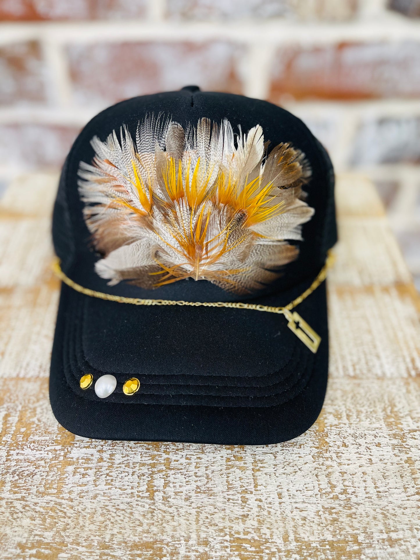 Black feather with cross charm hat