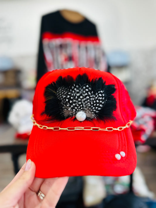 Red Trucker Hat with Pearl Feather