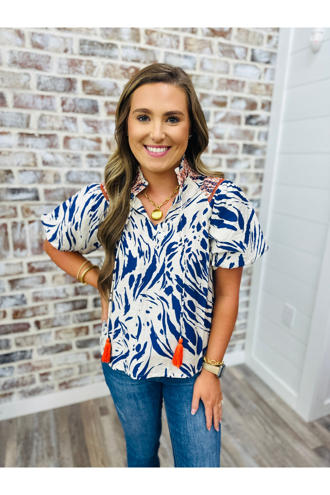short sleeve blue and orange design top
