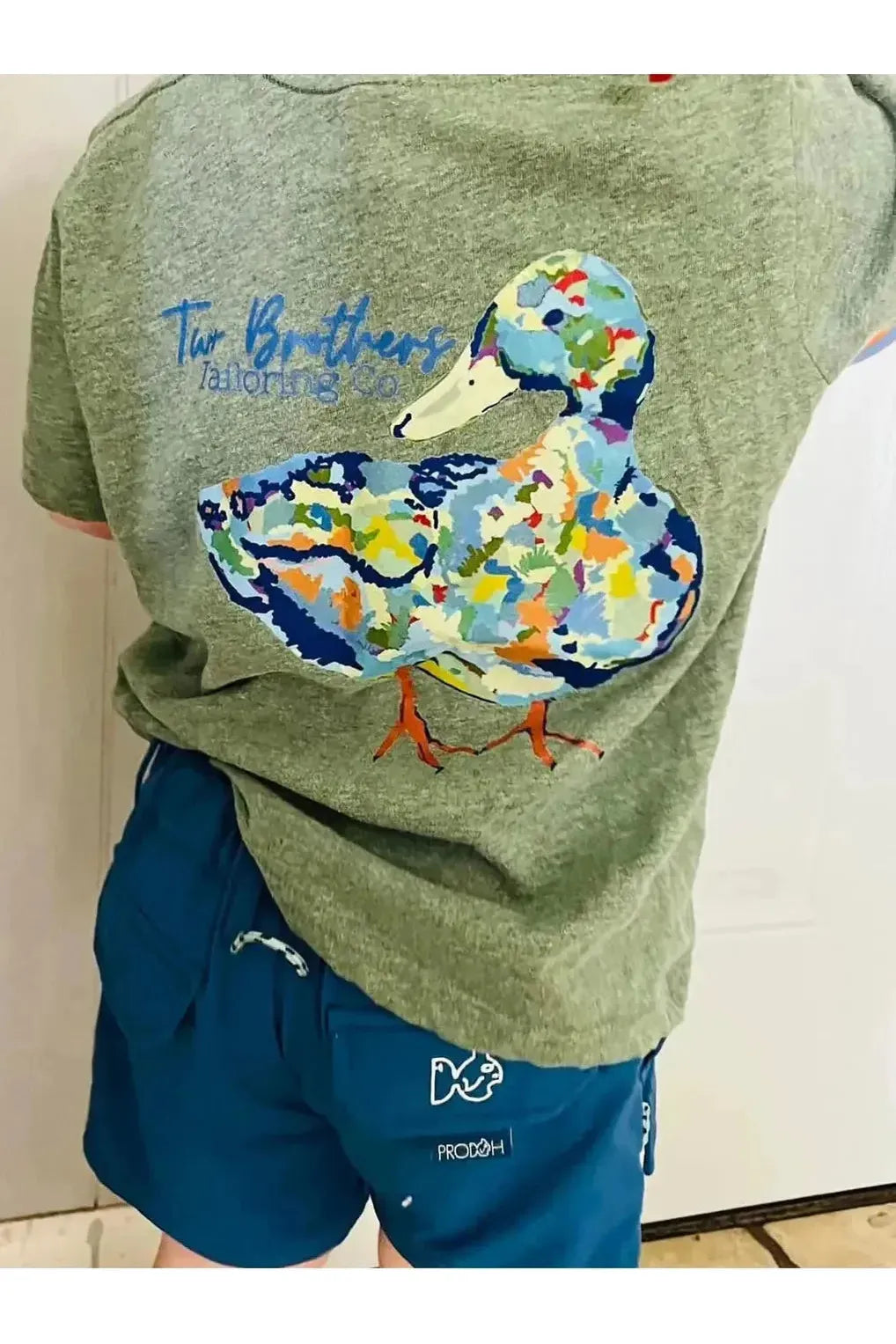 Youth boys olive tshirt with multicolored duck on the back
