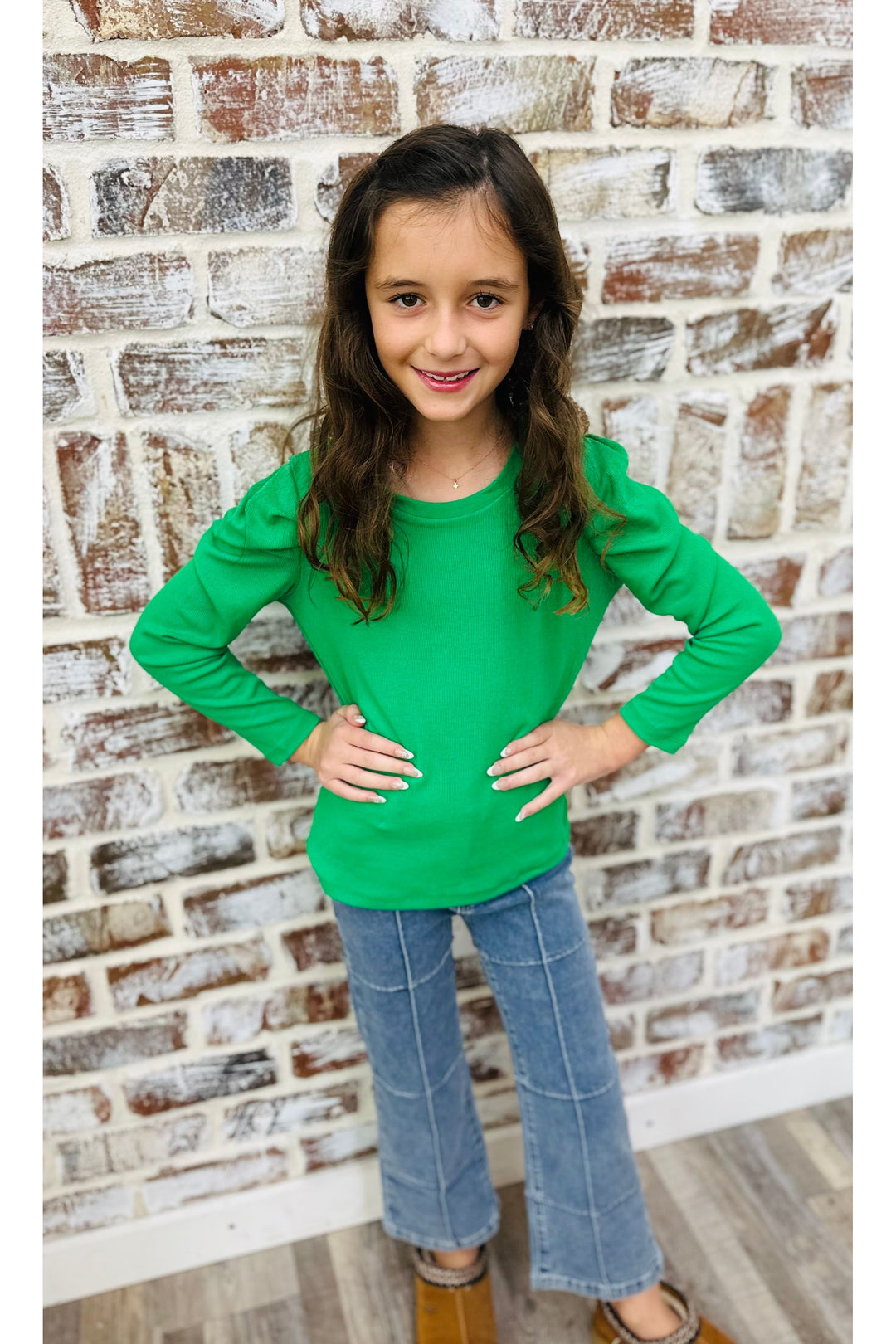 Girl wearing green shirt 