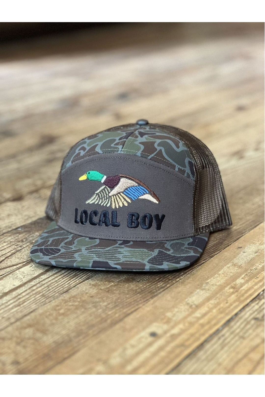 Camo hat with duck on front and Local Boy stitching