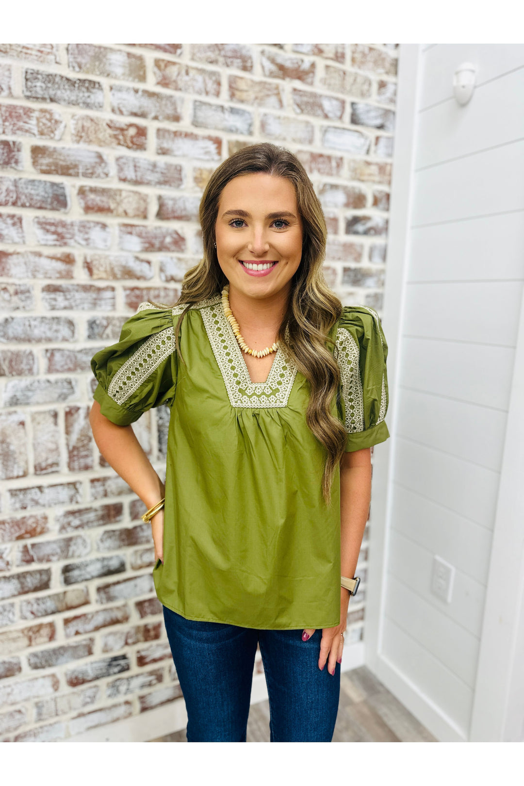 short sleeve olive top with cream colored lace details