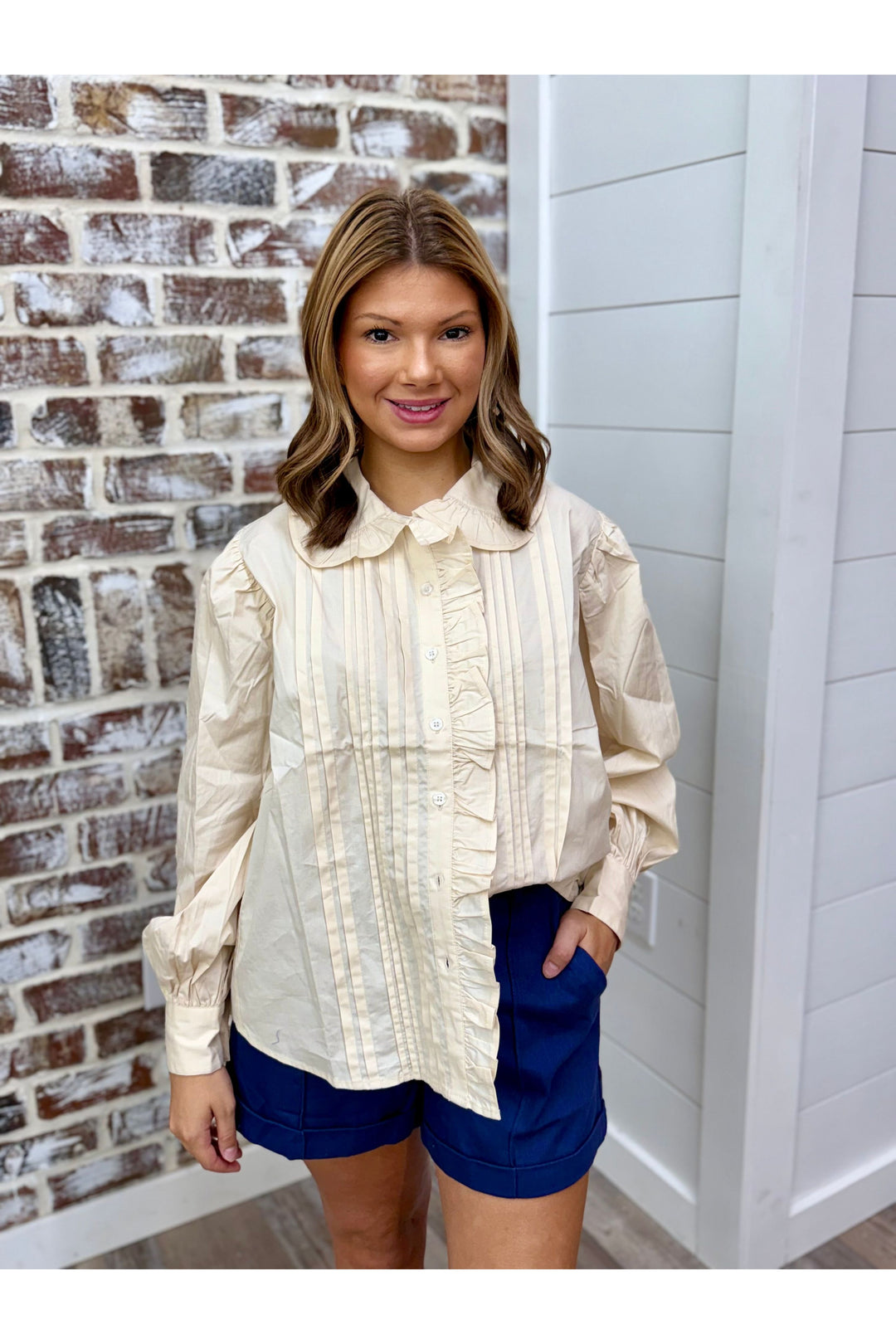 Long sleeve Solid Pleat Ruffle Trim Top in ivory