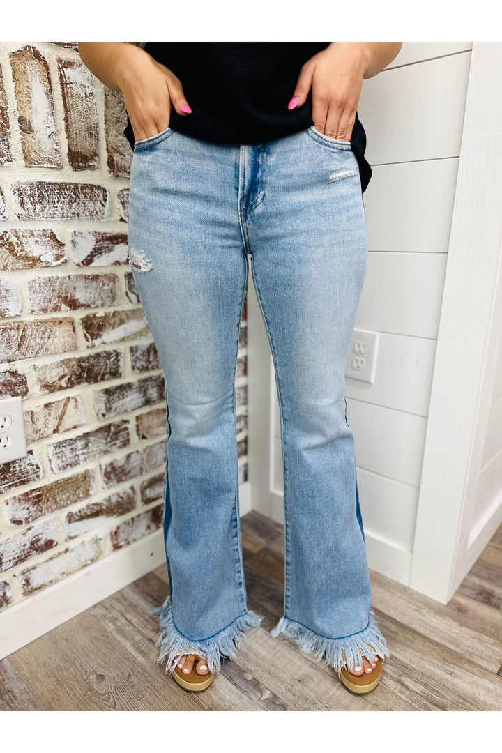 Mid Rise Flare Fray Jeans