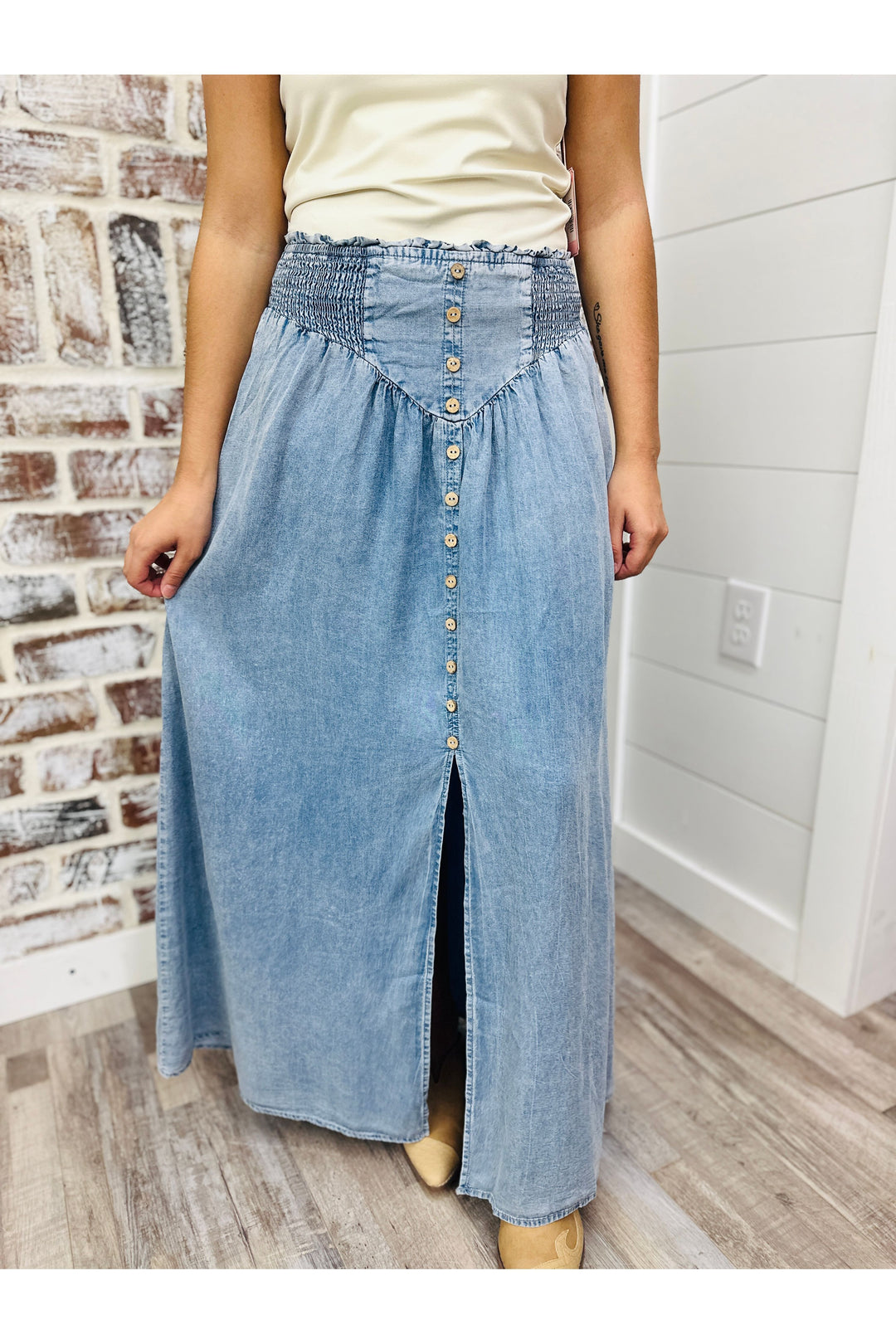 Denim Front Slit Maxi Skirt features a smocked waistband 