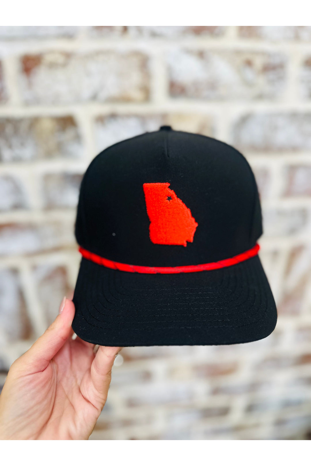 Black hat with red Georgia state and red rope design 