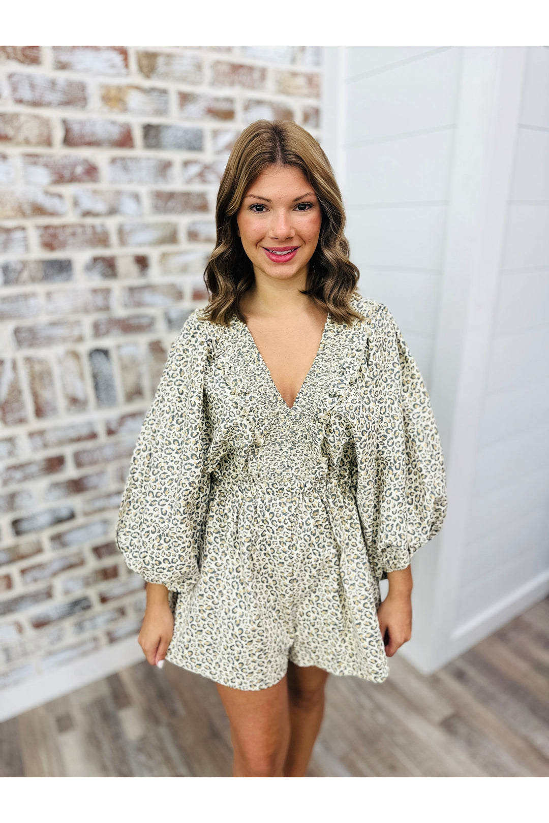 long sleeve smocked at the waist leopard print romper