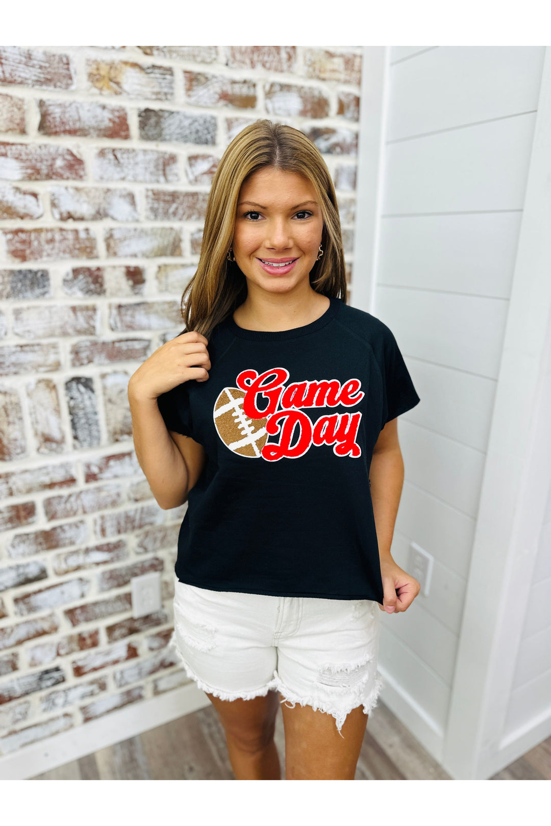 black top with Game Day and football applique